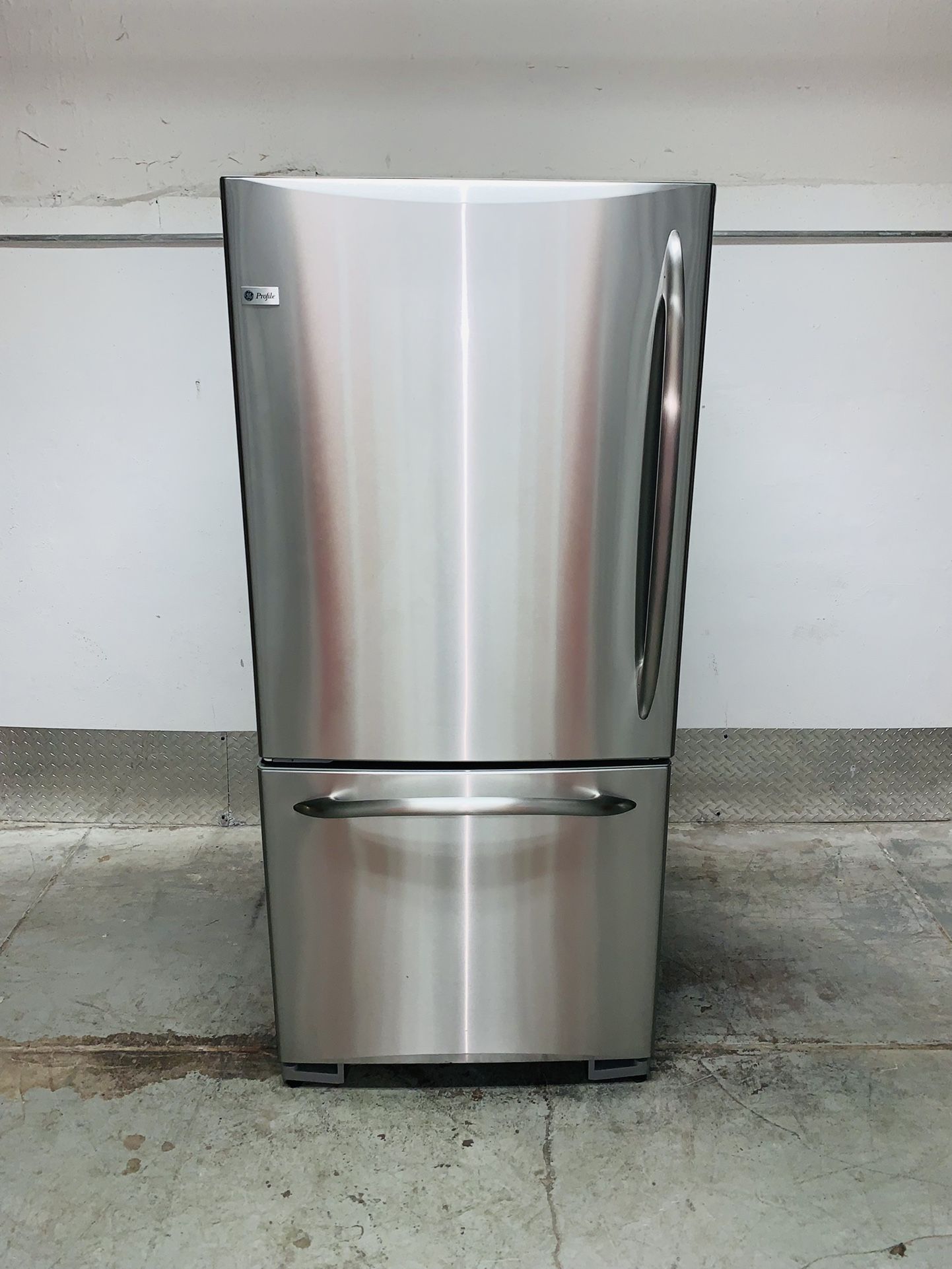 GE stainless steel refrigerator 30 wide 32 deep and 66 high in very perfect condition a receipt for 60 days warranty
