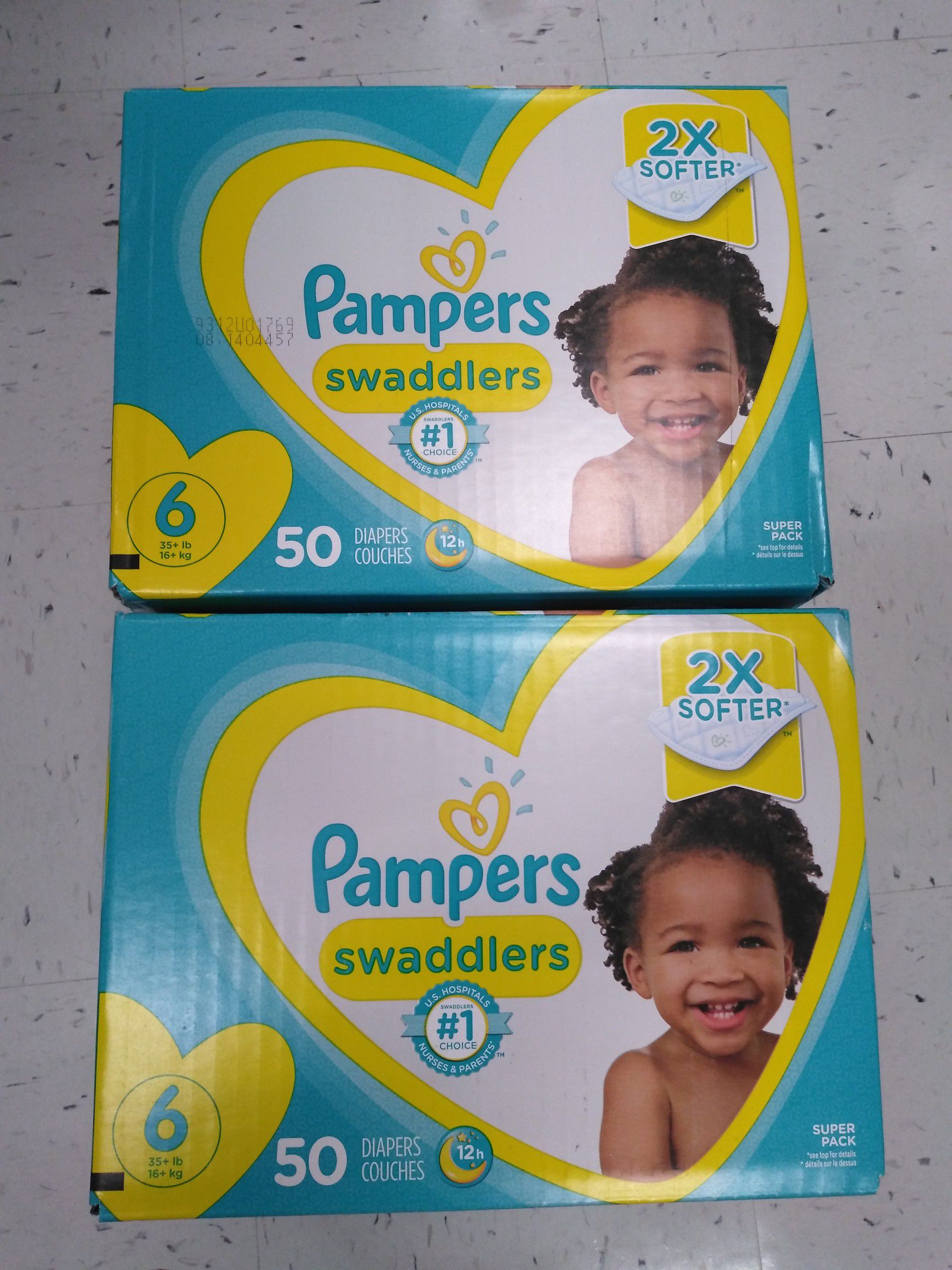 Two boxes of Pampers size 6