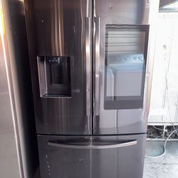 Samsung Dark Stainless Steel Refrigerator And Freezer