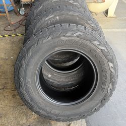 Set of 4 Toyo Open Country R/T tires – LT295/70R17