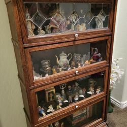 Antique, oak lawyer's bookshelves.The 1 with 3 shells is $500.The one with four shelves is seven hundred dollars , perfect doors , open and slide in g