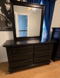 Black Wood Dresser with Multiple Drawers