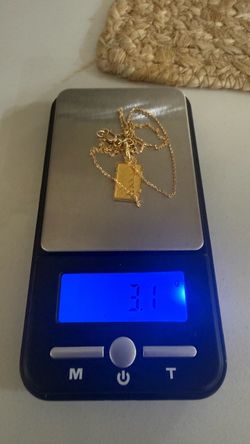 18k gold necklace and 1gram 24k bar pendant