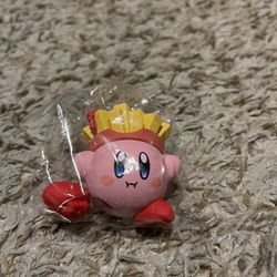Kirby collectible figure, specifically a "Kirby Fries" mascot, sometimes sold as a Christmas tree ornament.  Character: Kirby from the Nintendo series