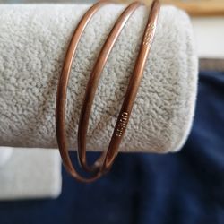 Guess 3 Interlocking Bracelets