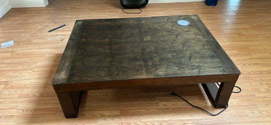 Coffee table with charging station