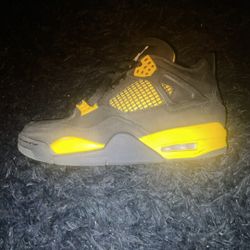 Yellow Thunders Jordan 4s