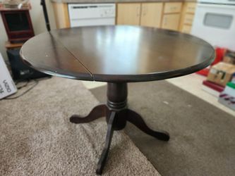 Pedestal Dining Room Table