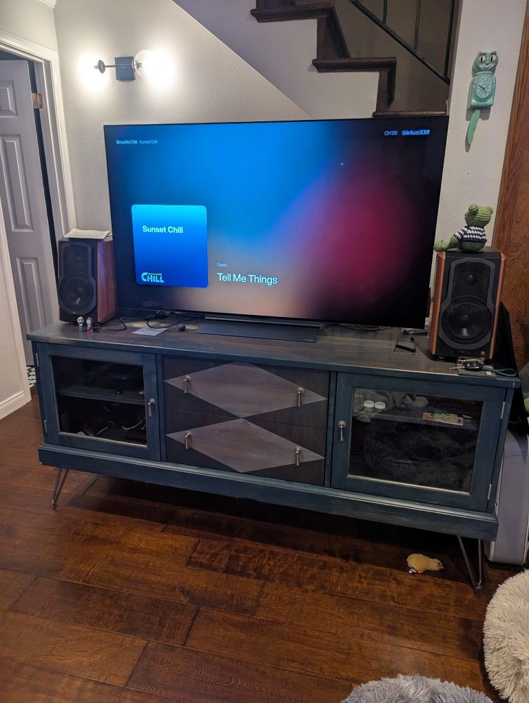 Solid wood entertainment console