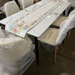  71 Inch Dining Table With 6 chairs - Modern Rectangular Sintered Stone Table with High Hardness and Easy Maintenance - Stylish White Brand new and al