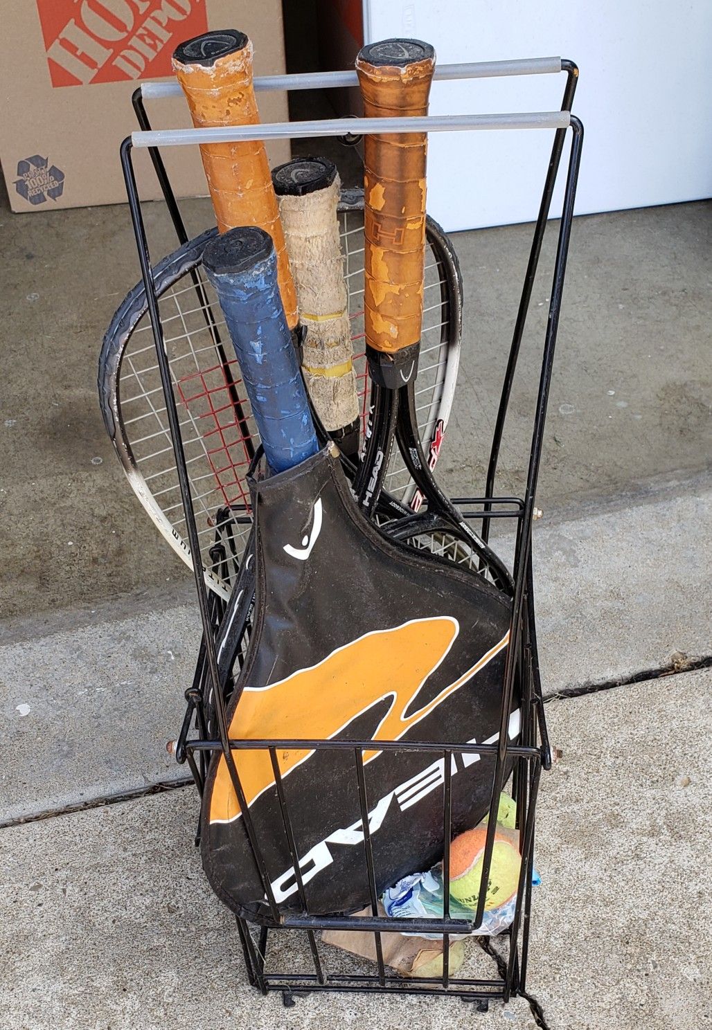 Tennis rackets and ball cage collector