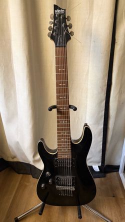 Left handed Schecter Omen 7