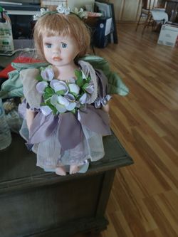 A heritage signature collective  violet petals  Porcelain doll