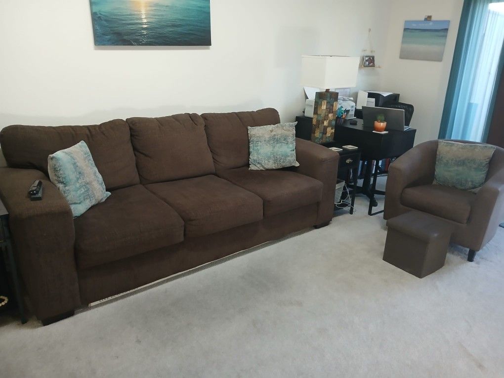 sofa and armchair in brown