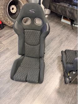 Racing bucket seats.