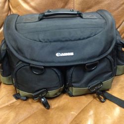 Canon Camera bag w/shoulder strap inside dividers and zippered pockets inserts