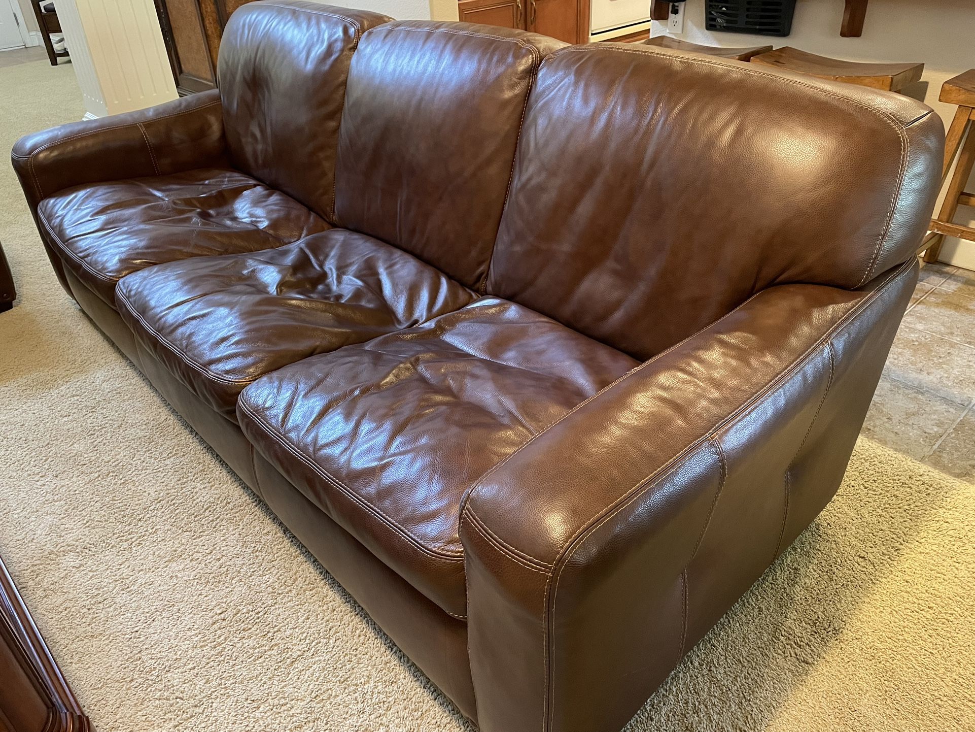 Free leather brown sofa
