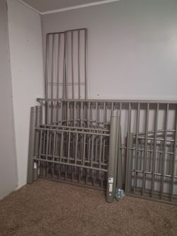Grey metal twin over twin bunkbed frame