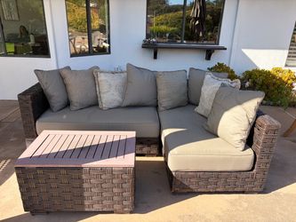 Outdoor couch 2 sections and coffee table