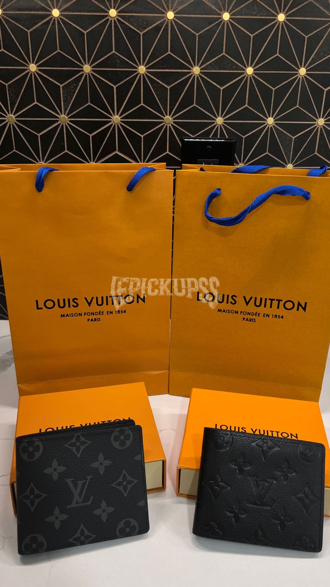 Louis Vuitton “Multiple” Wallet