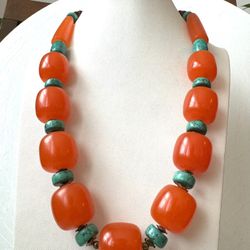 Stunning vintage and preowned orange amber resin beads and Turquoise necklace 25”inch long