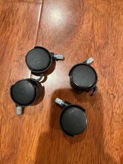 Set of 4 brand-new swivel casters for shelving units.
