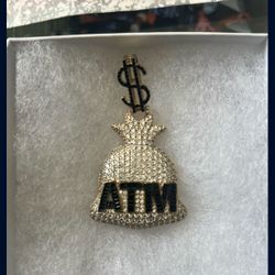 Moissanite and 18 karat gold pendant