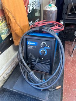 Miller 140 mig welder with cart