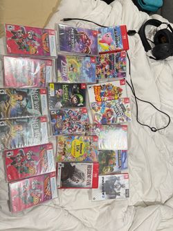 15 switch 1 and 2 games + 4 bonus copies top row is new but no seal, middle and bottom row are all brand new sealed