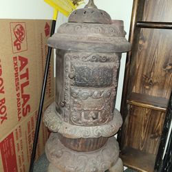 Antique Round Oak Stove (Estate Of P. D. Beckwith)