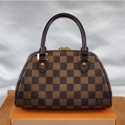 Authentic Louis Vuitton Mini Rivera