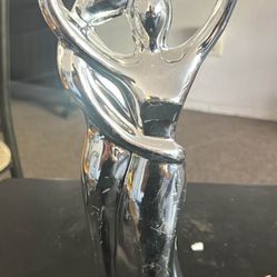 Polished Silver Paint Ceramic Embracing Couple Statue.