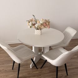 Dining table and four chairs