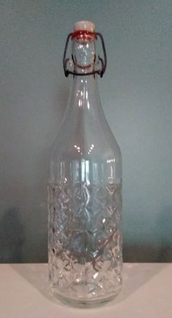 12.75" tall x 3.5" wide Textured Clear Glass Bottle with Sealed Pop Top