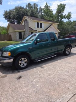 1999 FORD A/C  V-6 $5,800 A MI NOMBRE