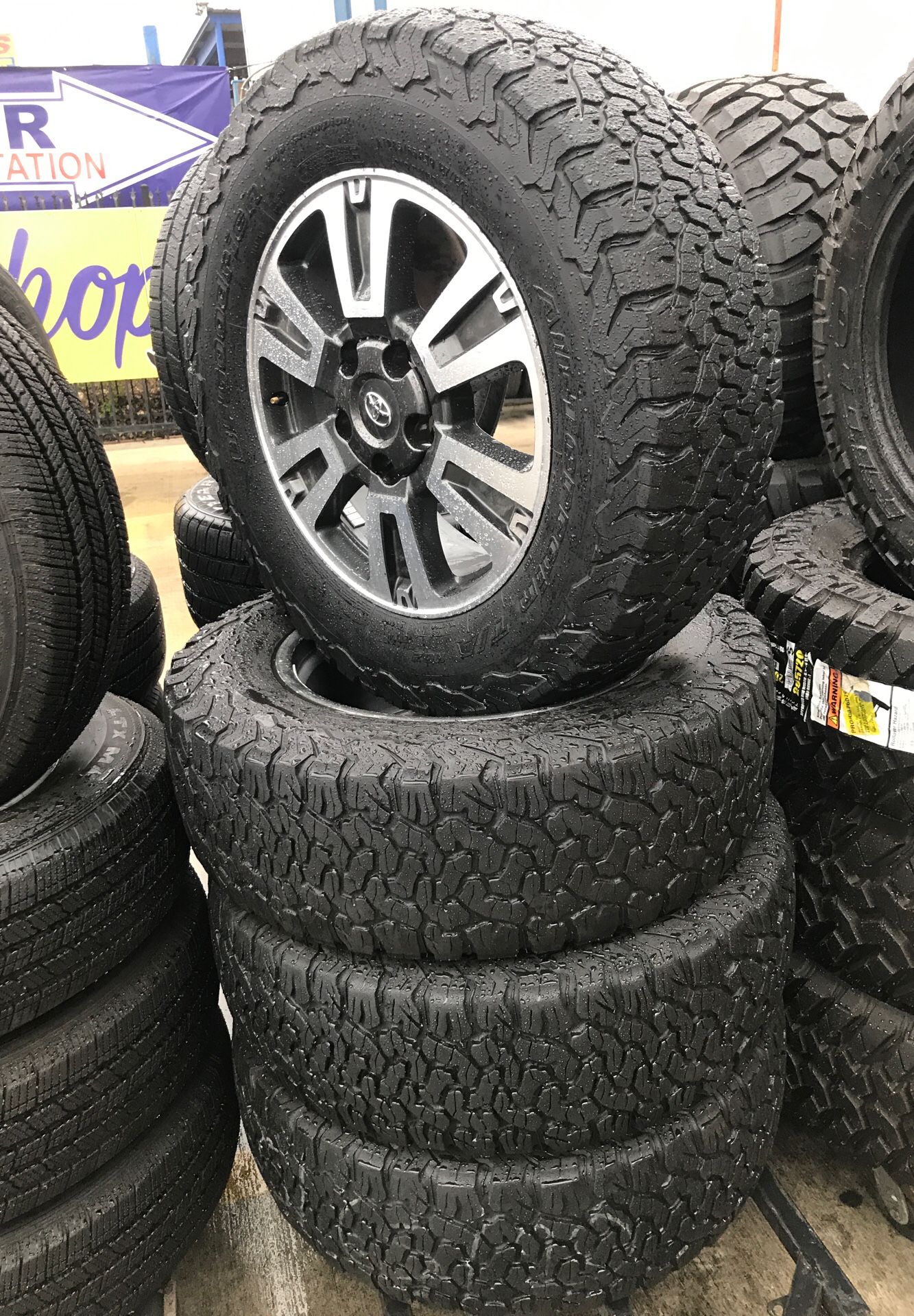 285-65-20 All Terrain rims and tires