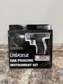 Ear piercing gun machine