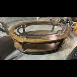 Very nice wood and glass two tier coffee table 45”L 16.6”T 25”W