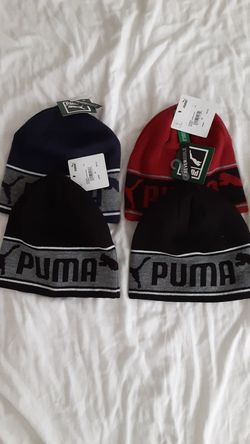Puma beanies.....brand new.....10 each.firm