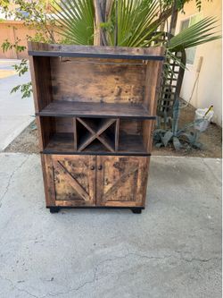 Rustic bar cabinet with wine rack