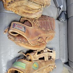 Three Baseball Gloves $25 Each
