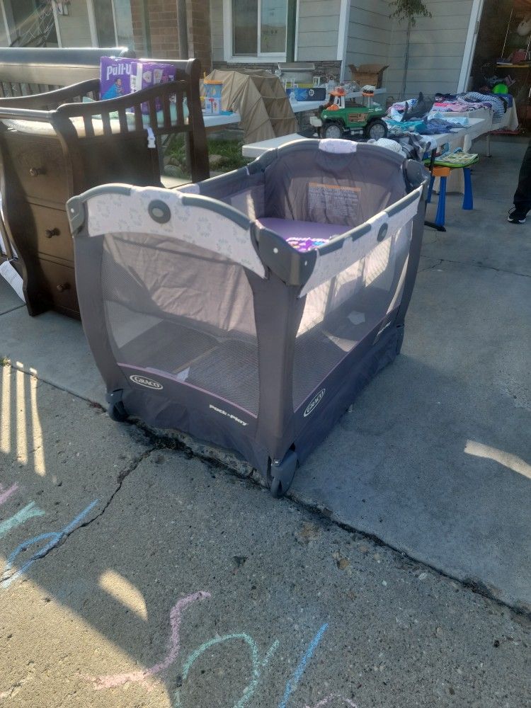 Pack and Play By Graco