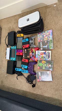 Nintendo’s, holders, tv set up, and controllers
