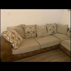 Novelia Leather and Upholstered Couch with Chaise Sofa