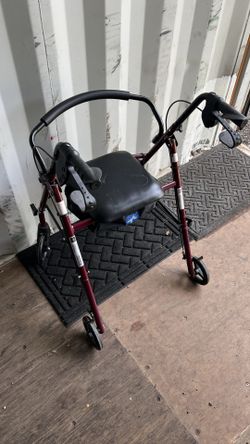 Foldable rolling walker with seat