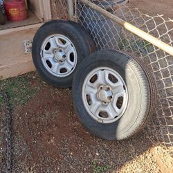 Pair Of Toyota Rims and almost new Tires 