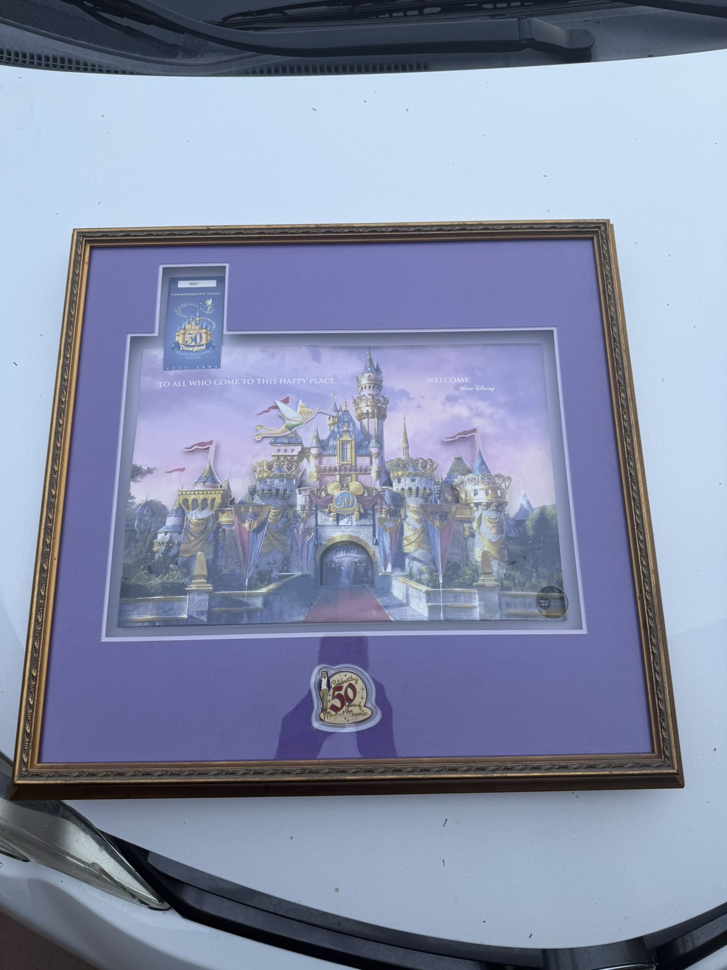 A DISNEYLAND 50TH ANNIVERSARY COMMEMORATIVE TICKET NUMBER 2 SLEEPING BEAUTY CASTLE WITH COA