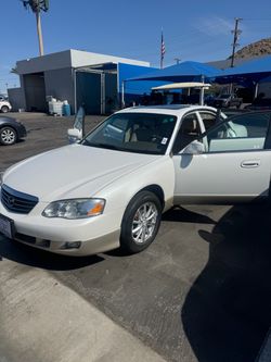 Mazda Millenia White 4-Door Sedan