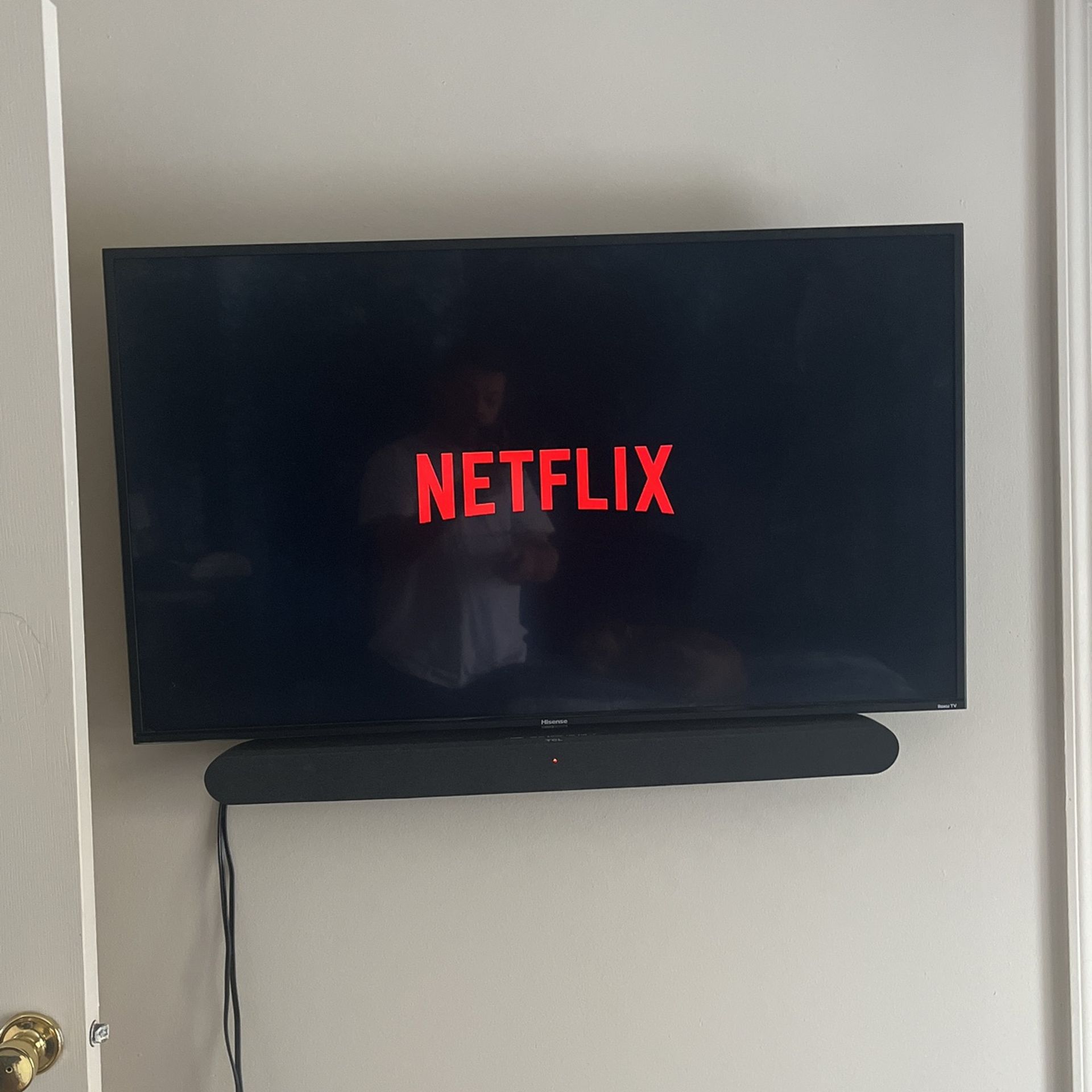Hisense (Roku TV) W/ Samsung soundbar &Subwoofer.