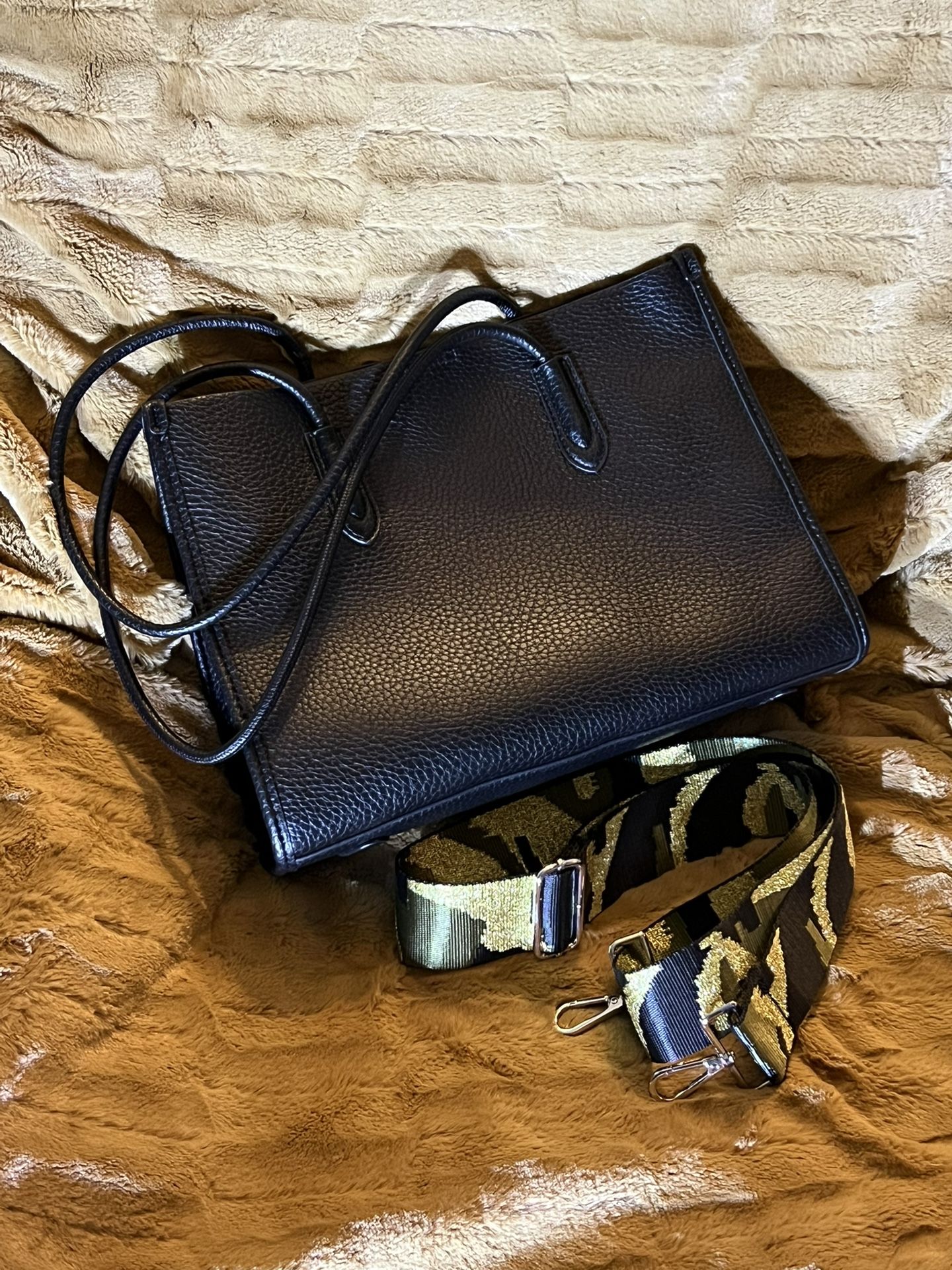 K.Carroll Handbag In Black Vegan Leather With Adjustable Camo Guitar Strap .